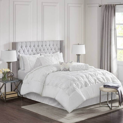 Seven piece Lindsey bedding set in white polyster polyoni featuring comforter and pillow shams, in full and queen sizes.
